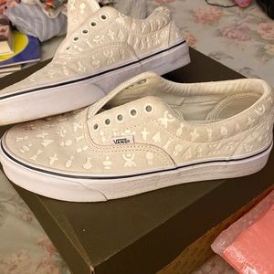 Vans.  Off white- light gray almost.  Suede. Very cute.